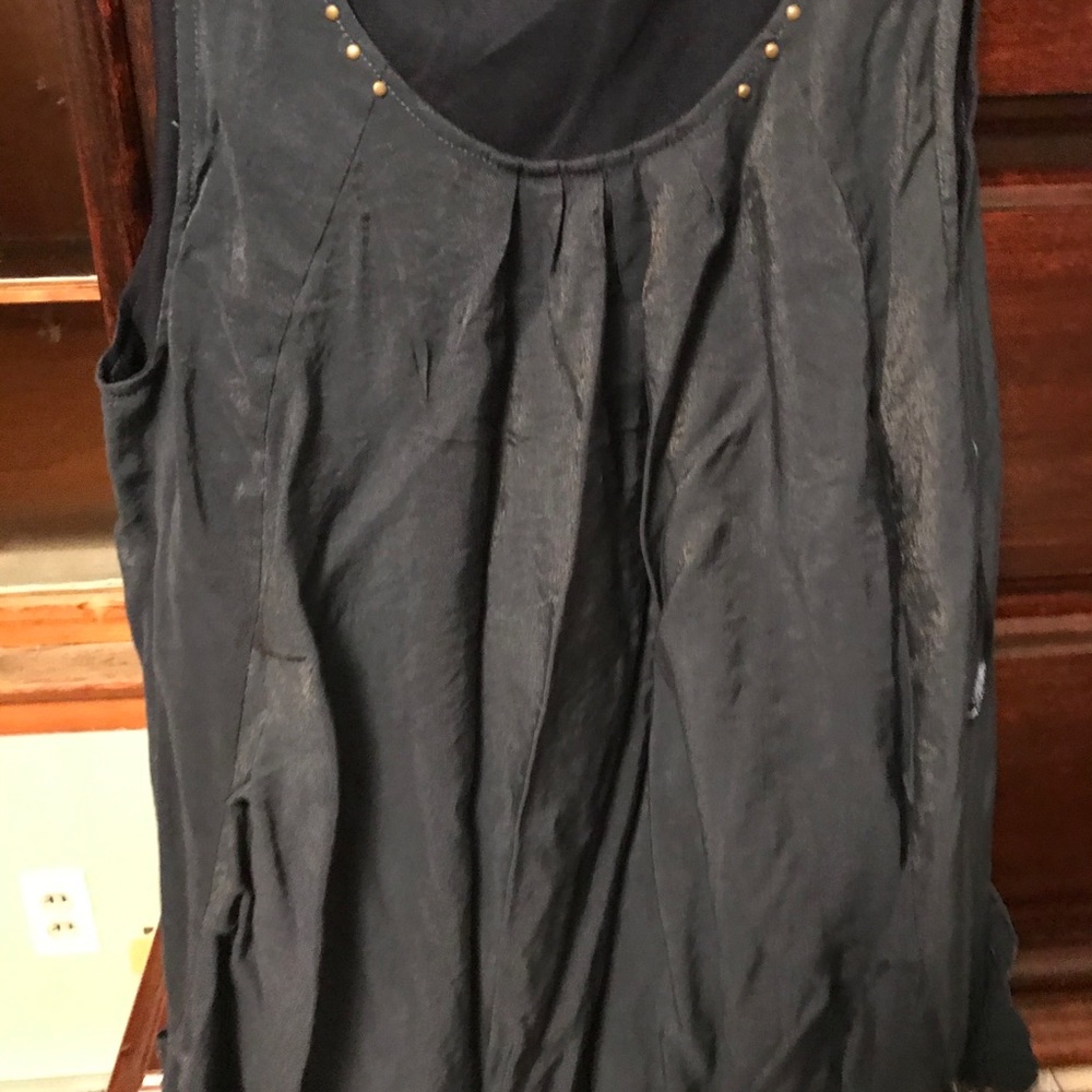 Shimmer top wore with navy leggings
